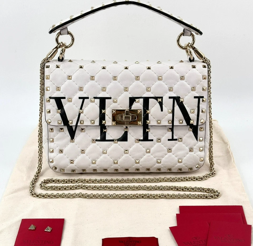 Bolso de hombro mediano Valentino Garavani VLTN Rockstud Candystud de cuero blanco Foto 1 de 4