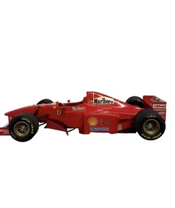 Minichamps 1/18 - Ferrari F 310B 1997 F1 - M.Schumacher Without Box - Picture 1 of 3