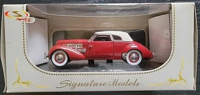 1937 CORD 812 SUPERCHARGED BURGUNDY 1/32 DIECAST MODEL BY SIGNATURE MODELS - Image 1 of 4