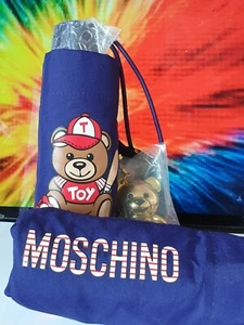 ☔️👨🏻🎤☔️NEW MINI PURPLE MOSCHINO UMBRELLA WITH STYLISH MATCHING COVER RRP £70 - Picture 1 of 14