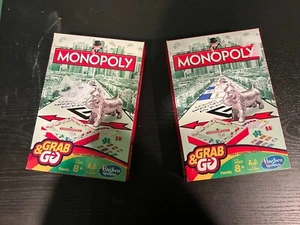2 PACKUNGEN Monopoly Grab and Go Travel Edition KOMPLETT Brettspiel Hasbro Gaming - Bild 1 von 2