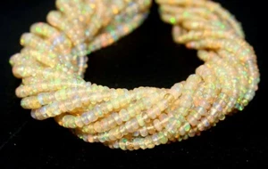 Cuentas de rondelle lisas de ópalo etíope natural de 15,5 pulgadas de largo de 2-4,5 mm - Imagen 1 de 5