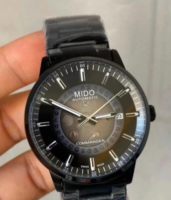 Reloj mecánico automático Mido Commander de acero negro para hombre luz nocturna M021 Foto 1 de 4