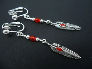 A PAIR OF TIBETAN SILVER RED CRYSTAL FEATHER THEMED CLIP ON EARRINGS. NEW. - Picture 1 of 1