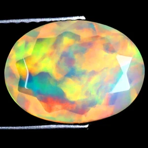 2.08 ct Incredible Oval (12 x 9 mm) Ethiopian 360 Degree Flashing Rainbow Opal - Picture 1 of 1