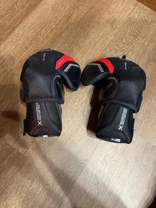Coderas de hockey sobre hielo Bauer Vapor 3X Pro tamaño intermedio mediano - Imagen 1 de 5