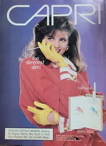 1989 Capri cigarettes Slimmest Slim brunette yellow gloves vintage ad - Picture 1 of 1