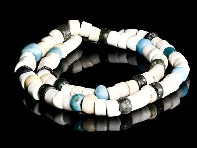 A Strand Of Antique African Trade Bohemian Tubular White, Blue, and Black Glass - Image 1 of 3