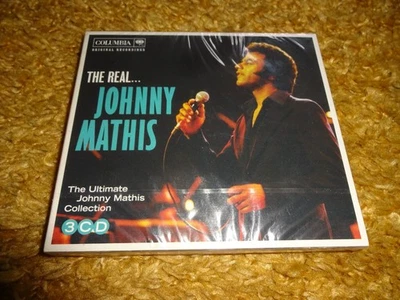 CD ALBUM - JOHNNY MATHIS - THE REAL... (NEW & SEALED) - Image 1 of 2