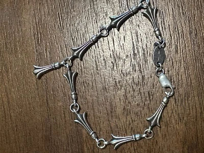 Pulsera mini cola cruzada corazones cromados plateada Foto 1 de 4