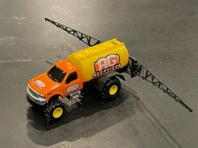 Vintage Maisto AG Services Liquid Fertilizer Truck w/ Boom Sprayers, 1/64 - Image 1 of 3