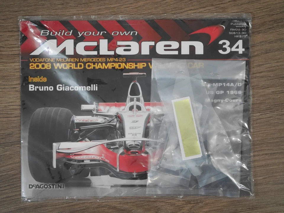 DeAGOSTINI build your own 1/8 Mclaren MP4-23 Kyosho Issue 34 Model Parts Kit - Image 1 of 1