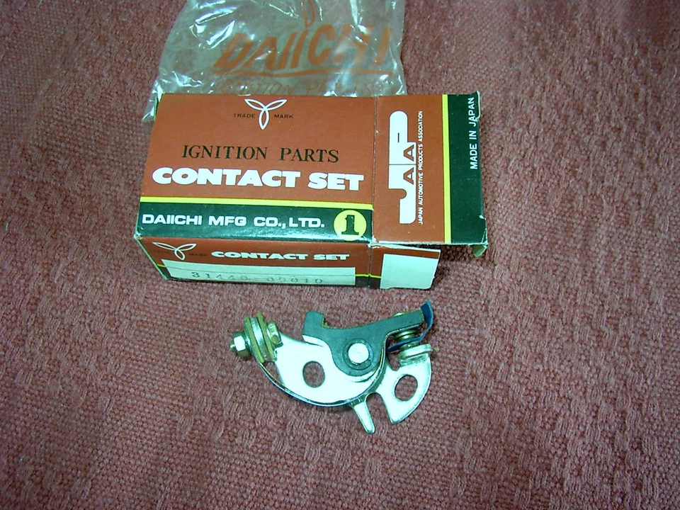 SUZUKI GT185 K125M NOS RIGHT HAND CONTACT POINTS 31440-09010 - Imagem 1 de 1