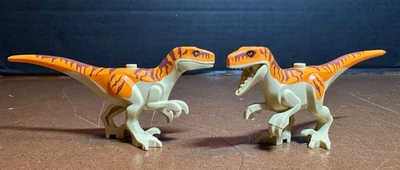 LEGO Jurassic world Atrociraptor Dinosaur Minifigure Orange 76946 lot of 2 - Image 1 of 4