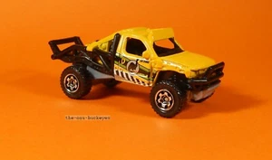 2014 Matchbox Loose Rock Shocker Yellow Lil Dino Combine Shipping Brand New - Picture 1 of 1