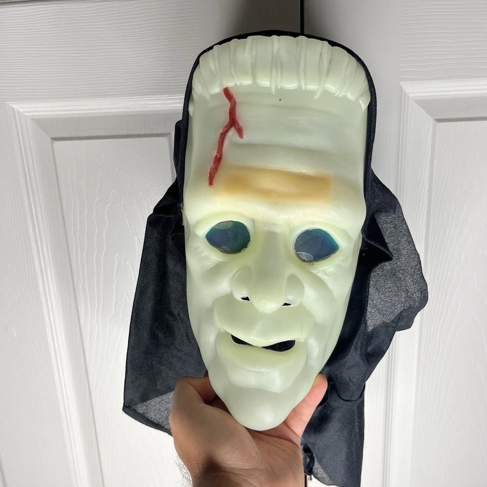 Glow-in-the-Dark Monster Mask With Holographic Eyes Black Hood & Elastic Strap - Image 1 of 4