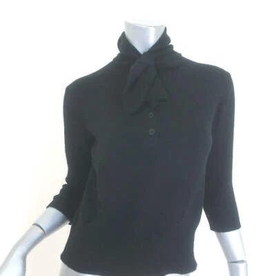 Suéter Christian Dior de cachemir con cuello atado negro talla US 6 Foto 1 de 4