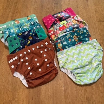 Lote de 8 fraldas de pano de padrão misto com 3 forros - Imagem 1 de 4