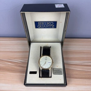 Reloj Seiko De Colección Hombres Esfera Champagne Tono Dorado Fecha Redonda 6533-8019 Banda Negra - Imagen 1 de 17