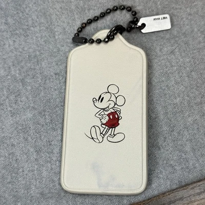 COACH BLANCO DISNEY MICKEY MOUSE PAVONEÁNDOSE LLAVERO ENCANTO CADENA ETIQUETA COLGANTE   Foto 1 de 4