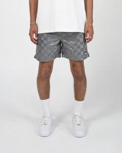 PANTALONES CORTOS EPTM A CUADROS - Imagen 1 de 5