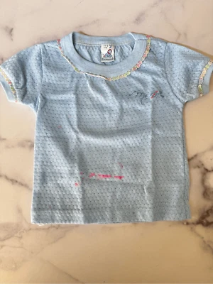 Garanimals Vintage Bebé Niña Delicado Top Básico Tejido Piqué Volantes Encaje Azul Pastel Foto 1 de 4