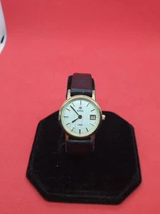 ladies royal london gold tone watch with date display window,black strap.#136. - Picture 1 of 8