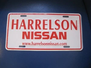NOS, HARRELSON NISSAN METAL BOOSTER LICENSE PLATE - Picture 1 of 2