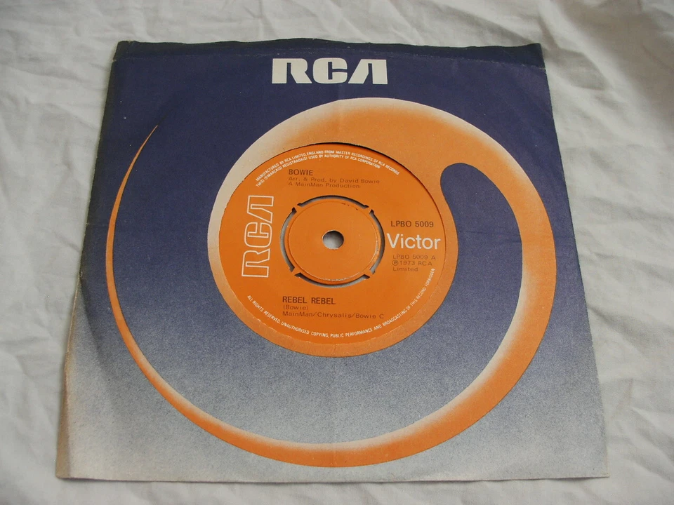 DAVID BOWIE REBEL REBEL HARD TO FIND UK PRESS RCA ORANGE LABEL FOUR PRONG CENTRE - Image 1 of 4