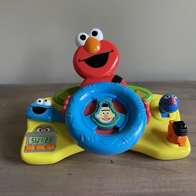 Juguete conductor Sesame Street Elmo Giggle N Go 2006 volante Mattel suena raro Foto 1 de 4