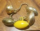 5 Original 1950s GOLD TONE PLASTIC Football Ball Charm Key Chain Unused keychain