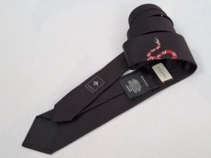 GUCCI Seidenkrawatte mit Kingsnake Motiv in Schwarz. - Bild 1 von 15