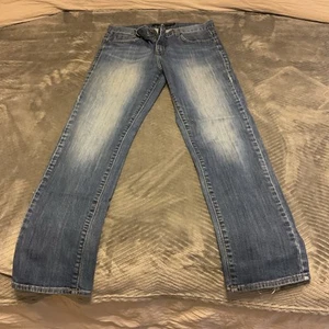 Calvin Klein Womens Flare Fit Jeans Light Wash Size 30/10 - Picture 1 of 5