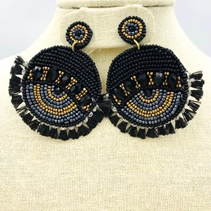 Evil Eye Quaste Rocailles Ohrringe - Perlen, Viola, erhältlich in schwarz oder weiß - Bild 1 von 9
