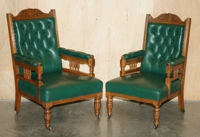 PAR DE SILLONES ANTIGUOS VICTORIANOS TALLADOS A MANO DE ROBLE INGLÉS Y CUERO BIBLIOTECA Foto 1 de 4