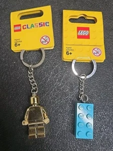 NEU LEGO 852688-Gold Minifigur Schlüsselanhänger Amd 853380 - Bild 1 von 2