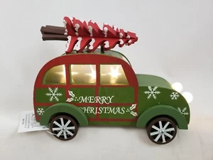 Green Woody Car Lighted LED with Pine Tree Merry Christmas Figurine made of Wood - Bild 1 von 2