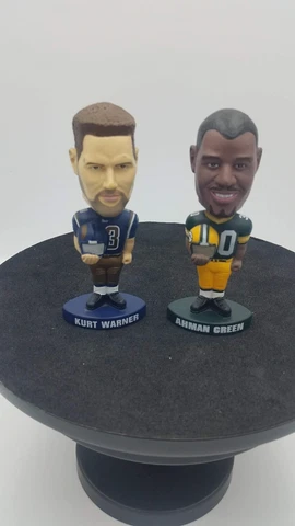 Two 4 in. Bobbleheads Kurt Warner #13 and Ahman Green #30 Cover