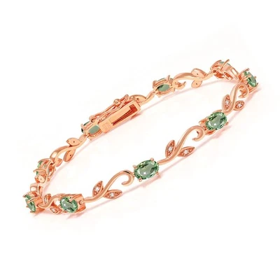 Brazalete de tenis enchapado en oro rosa de 18 quilates con zafiro verde y diamantes para Foto 1 de 4