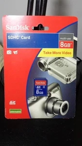 SANDISK SDHC CARD 8GB CLASS 2 ~ NEW IN FACTORY SEALED PACKAGE- CAMERA CAMCORDERS - Zdjęcie 1 z 2