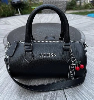 GUESS BLACK BARREL BAG CHERRY CRARM CROSSBODY/SHOULDER BAG - Image 1 of 4
