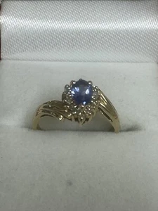 10k Gold Ring With Pear Shaped Tanzanite And Diamonds Around It - Picture 1 of 13