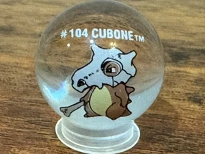Vintage 1st Edition Cubone #104 Pokemon ToyBiz Clear Glass Marble - Bild 1 von 4