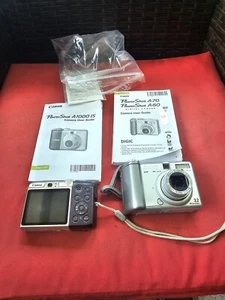 Canon PowerShot Camera Lot Of 2 A1000 IS & Powershot A70 4 Parts As Is K2 - Picture 1 of 22