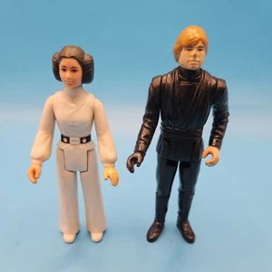 Vintage 1977 Star Wars Princess Leia and 1983 luke Figure by Kenner Hong Kong - Imagen 1 de 4