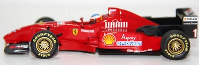 MINICHAMPS USATO 1:43 AUTO DIE CAST FERRARI F310 MICHAEL SCHUMACHER FRR MISTE 1 - Immagine 1 di 4