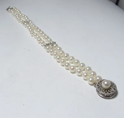 PULSERA DE PERLAS CULTIVADAS DE AGUA SALADA DOBLE HEBRA DE 5 MM A 5 1/2 MM CIERRE DE ORO 14K Foto 1 de 4