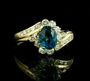 2Ct Oval Cut Lab-Created London Blue Topaz Ring 14K Yellow Gold Finish - Picture 1 of 6