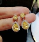 Lab Created 4.30Ct Pear Cut Yellow Citrine Drop Earrings In14k White Gold Plated