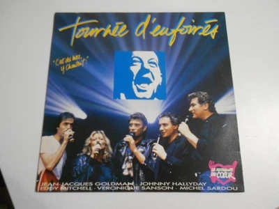 goldman hallyday mitchell sardou sanson : tournée d'enfoirés - Photo 1/2